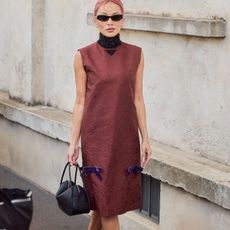 woman in burgundy dress