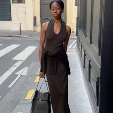 Woman in brown outfit